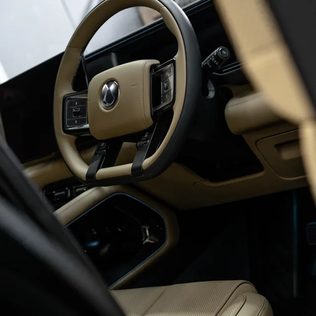 EV interior protected with fabric and leather coatings