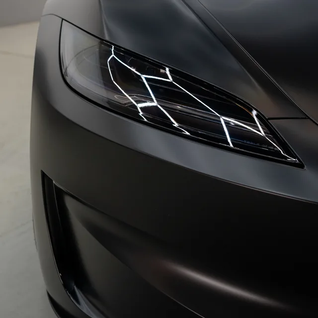 Matte PPF detail on a Tesla headlight