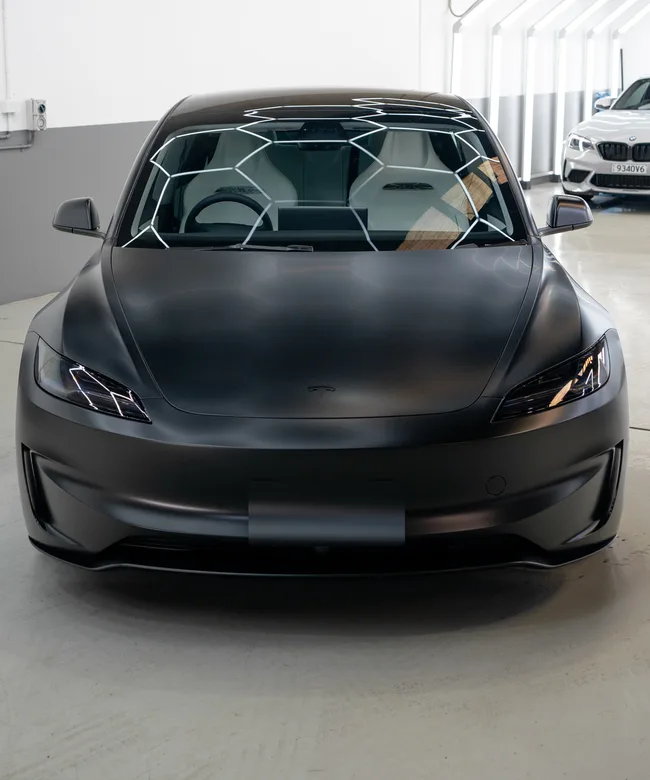 Matte black Tesla Model 3 with full PPF wrap