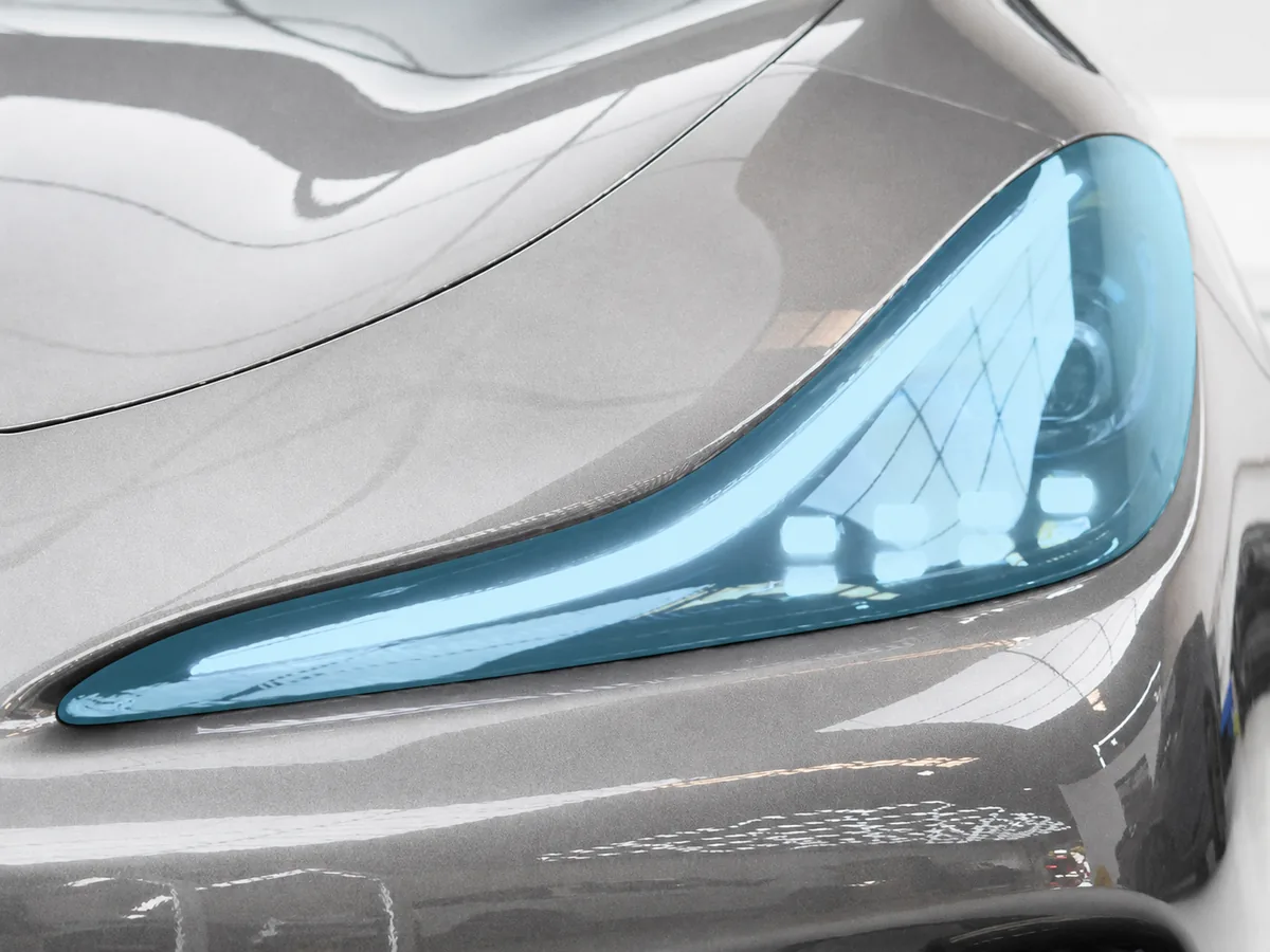 Paint protection film applied to a car headlight