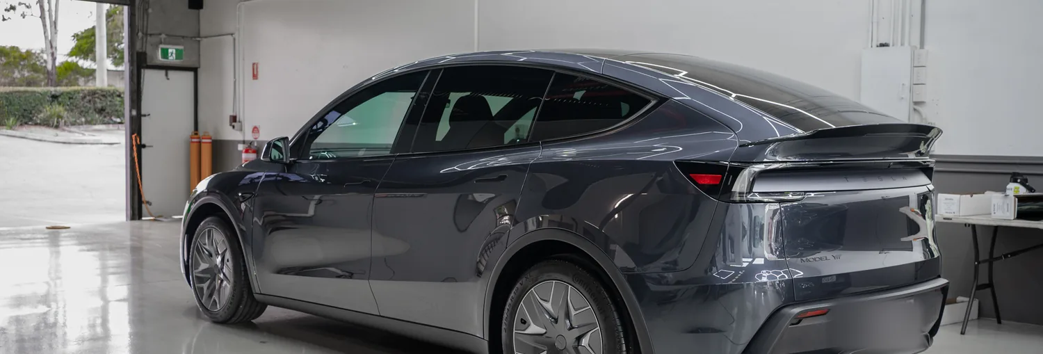 Tesla Model Y rear three quarter after ceramic coating and PPF