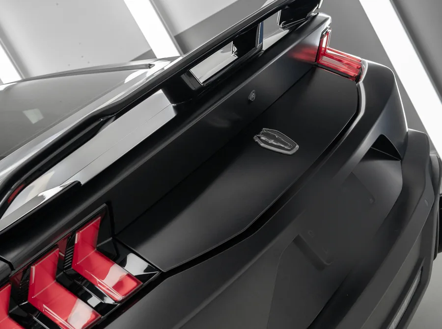 Satin PPF panels beside gloss black trim on a Ford Mustang Dark Horse