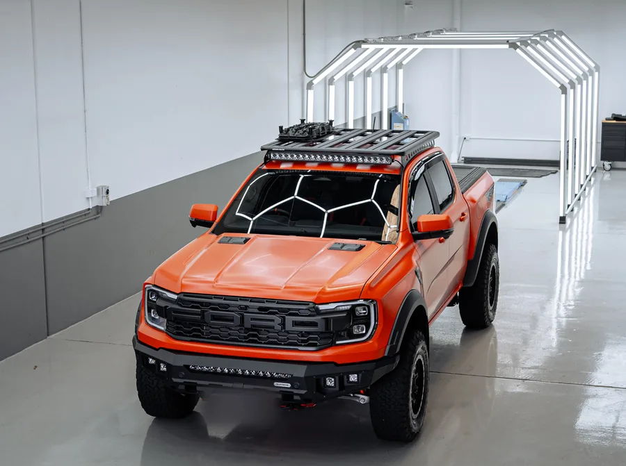 Satin PPF on an orange Ford Ranger Raptor in the Deluxe Detail studio